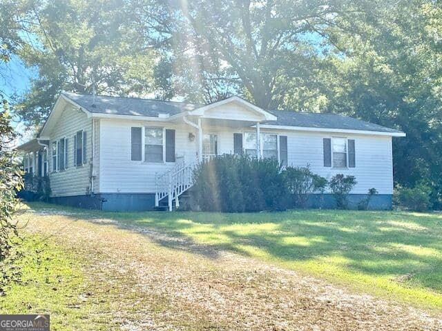 3 bedroom, 1 bathroom, 1,056 sq ft single family residence for sale at 3032 36th Avenue, Lanett, AL 36863 — photo 3