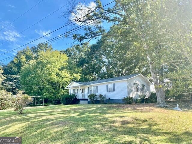 3 bedroom, 1 bathroom, 1,056 sq ft single family residence for sale at 3032 36th Avenue, Lanett, AL 36863 — photo 5