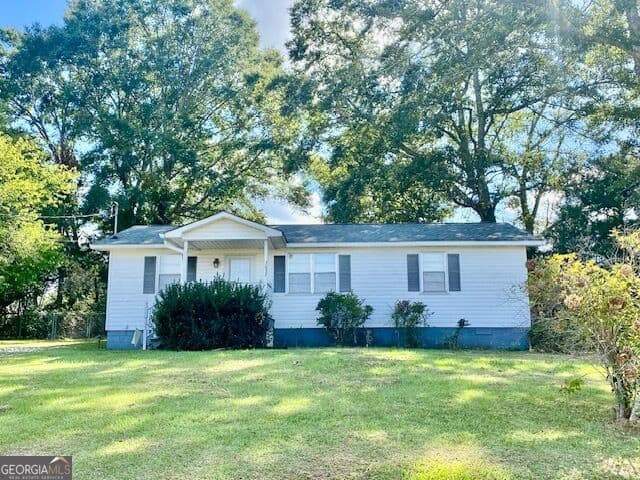 3 bedroom, 1 bathroom, 1,056 sq ft single family residence for sale at 3032 36th Avenue, Lanett, AL 36863 — photo 4