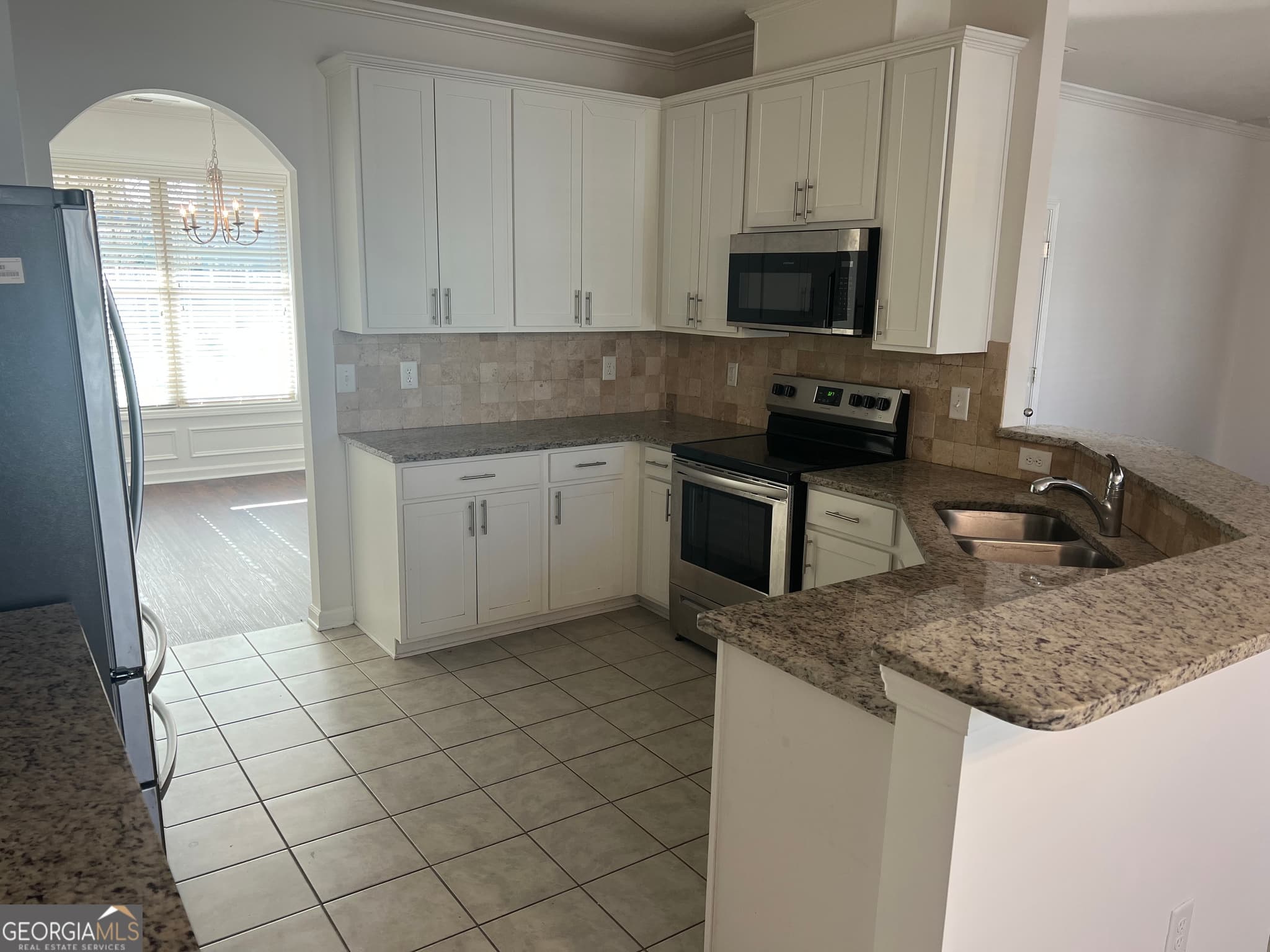5 bedroom, 3 bathroom, 2,600 sq ft single family residence for sale at 6499 Panasa Court, Norcross, GA 30093 — photo 7