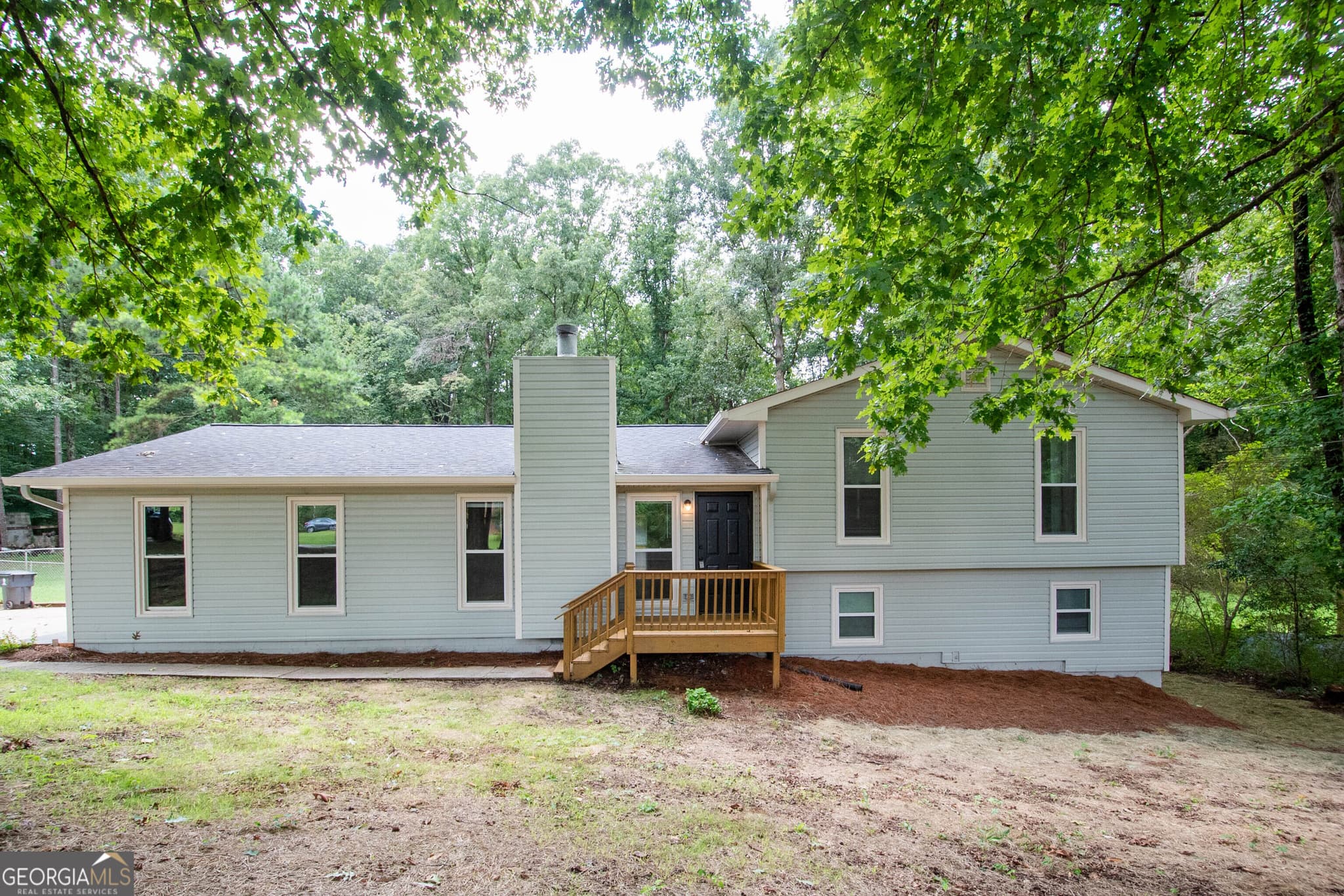 4 bedroom, 2.5 bathroom, 2,084 sq ft single family residence for sale at 240 Hearthstone Drive, Newnan, GA 30263 — photo 2