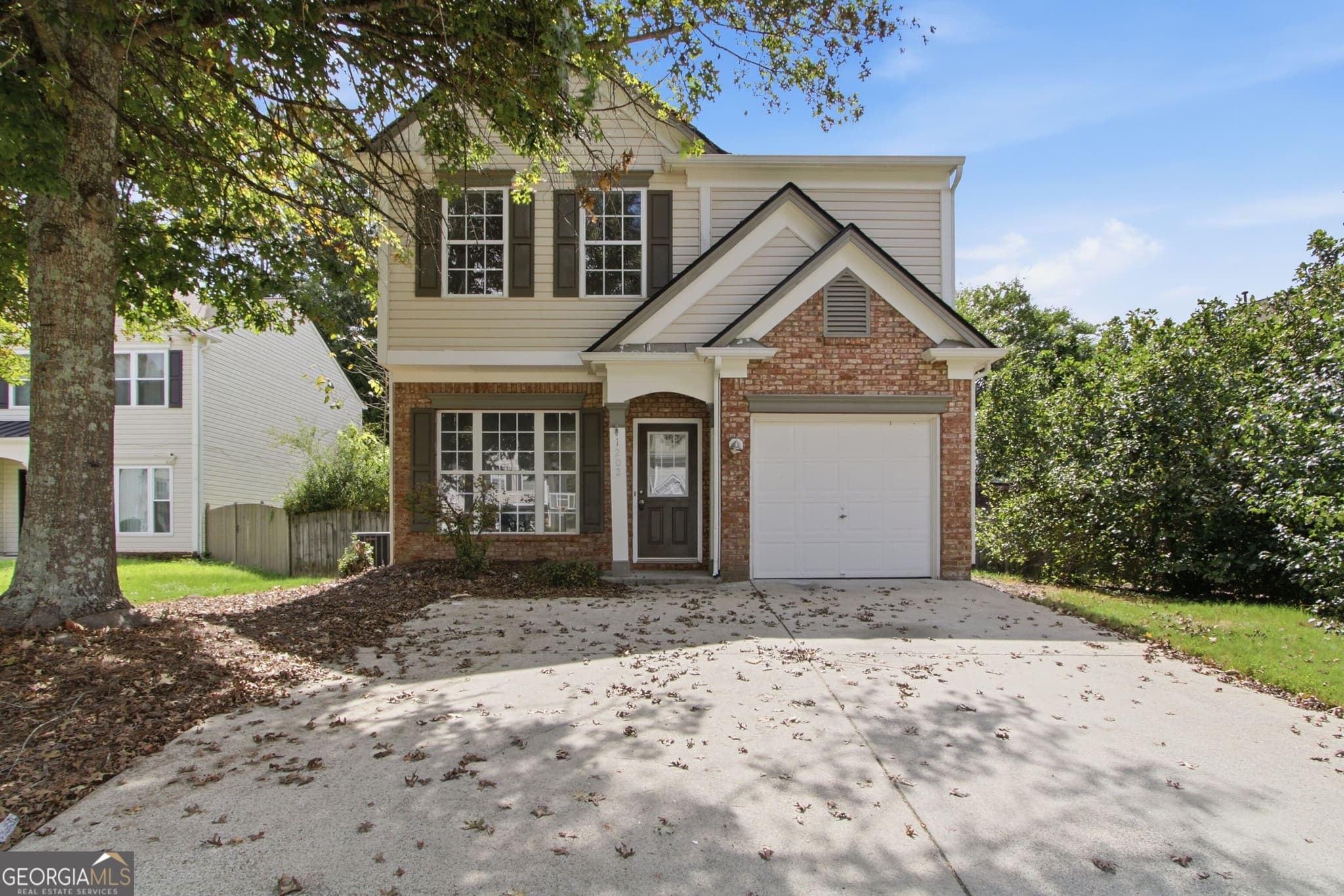 3 bedroom, 2.5 bathroom, 1,436 sq ft single family residence for sale at 1202 Astastula Way, Woodstock, GA 30188 — photo 1 of 27