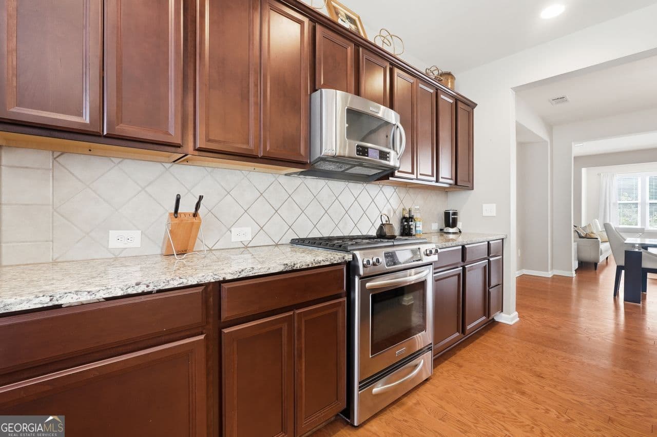 4 bedroom, 3.5 bathroom, 2,300 sq ft single family residence for sale at 4293 Laurel Creek Court 10, Smyrna, GA 30080 — photo 2