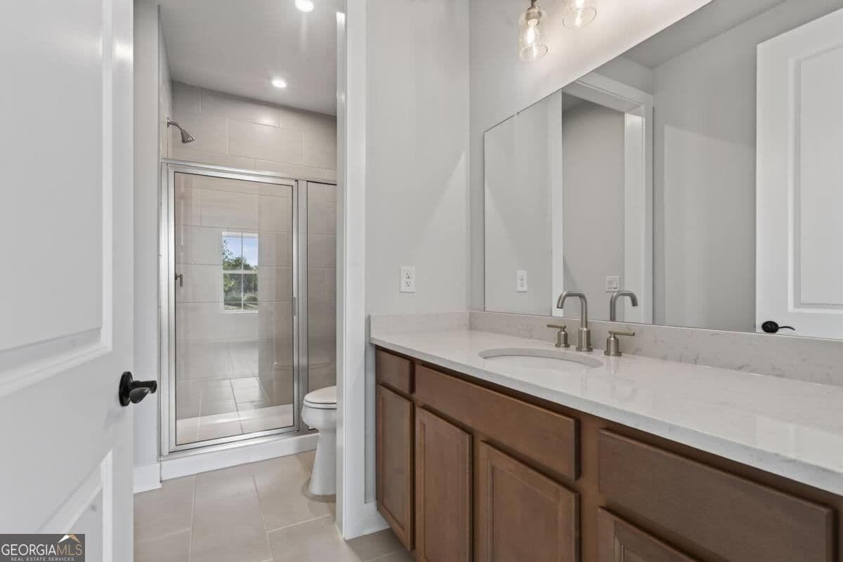 3 bedroom, 3.5 bathroom, 2,876 sq ft single family residence for sale at 1403 Canoe Drive, Greensboro, GA 30642 — photo 9