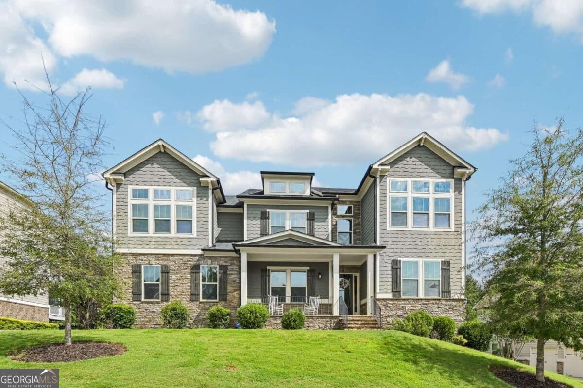 6 bedroom, 5.5 bathroom, 5,149 sq ft single family residence for sale at 606 Taymack, Woodstock, GA 30188 — photo 1 of 54