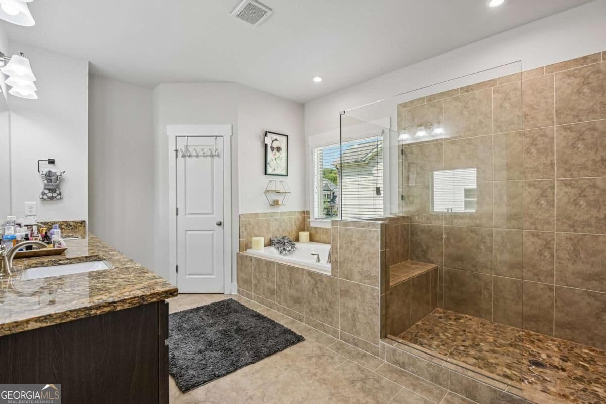 6 bedroom, 5.5 bathroom, 5,149 sq ft single family residence for sale at 606 Taymack, Woodstock, GA 30188 — photo 4