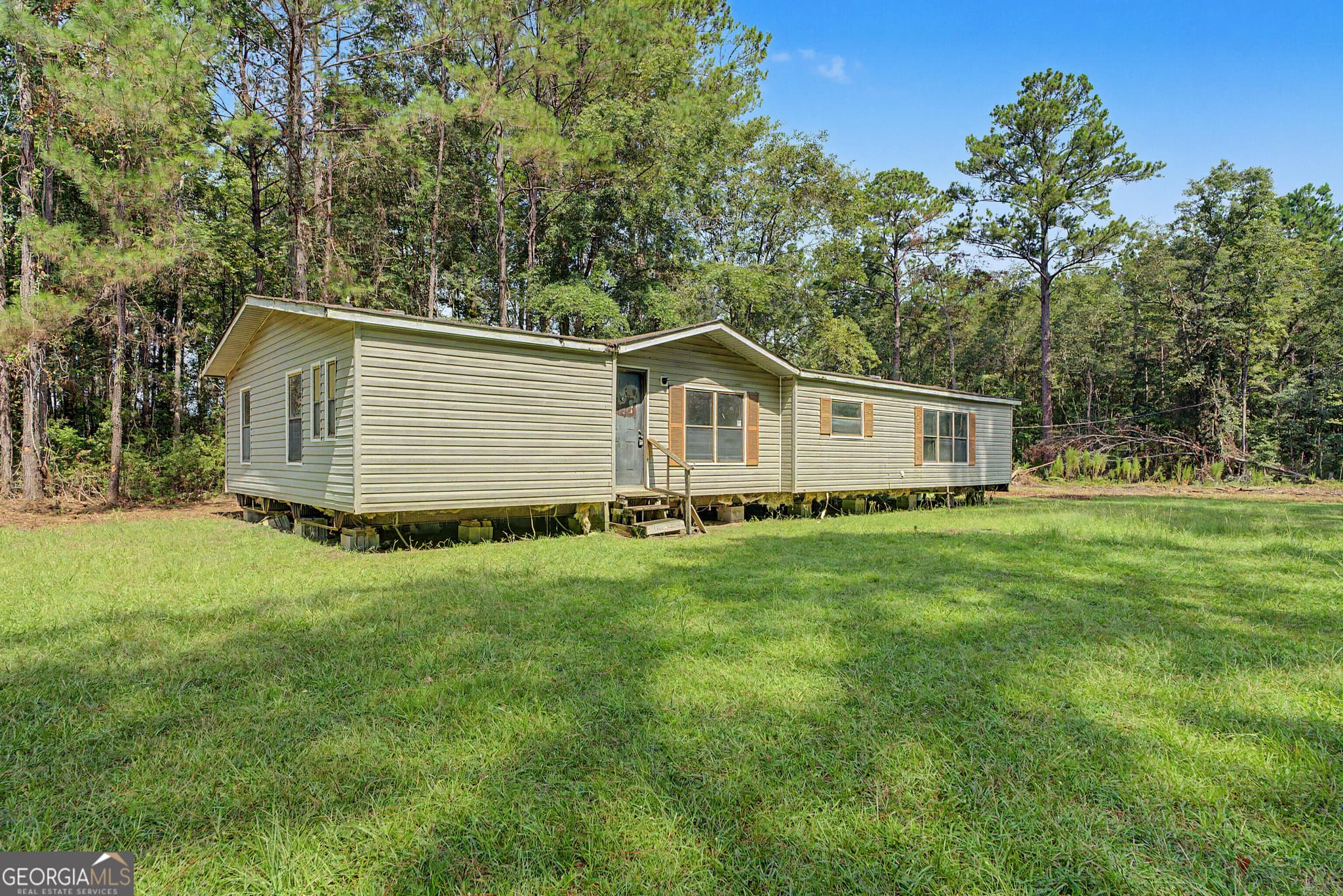3 bedroom, 2 bathroom, 1,700 sq ft manufactured home,single family residence under contract at 729 Reedsville Road, Clyo, GA 31303 — photo 2