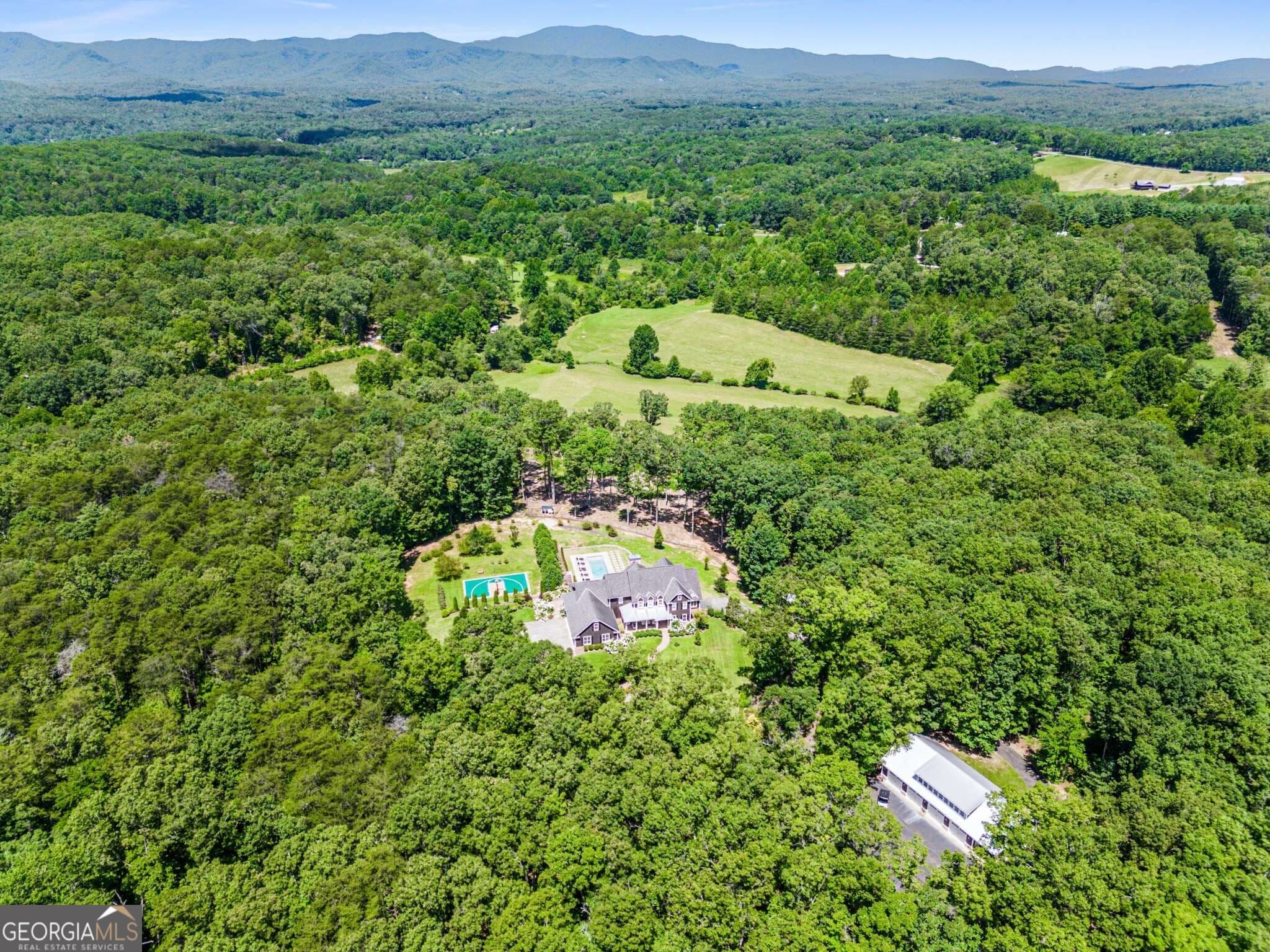 7 bedroom, 6 bathroom, 9,935 sq ft single family residence for sale at 254 Nicholson Road, Blue Ridge, GA 30513 — photo 3
