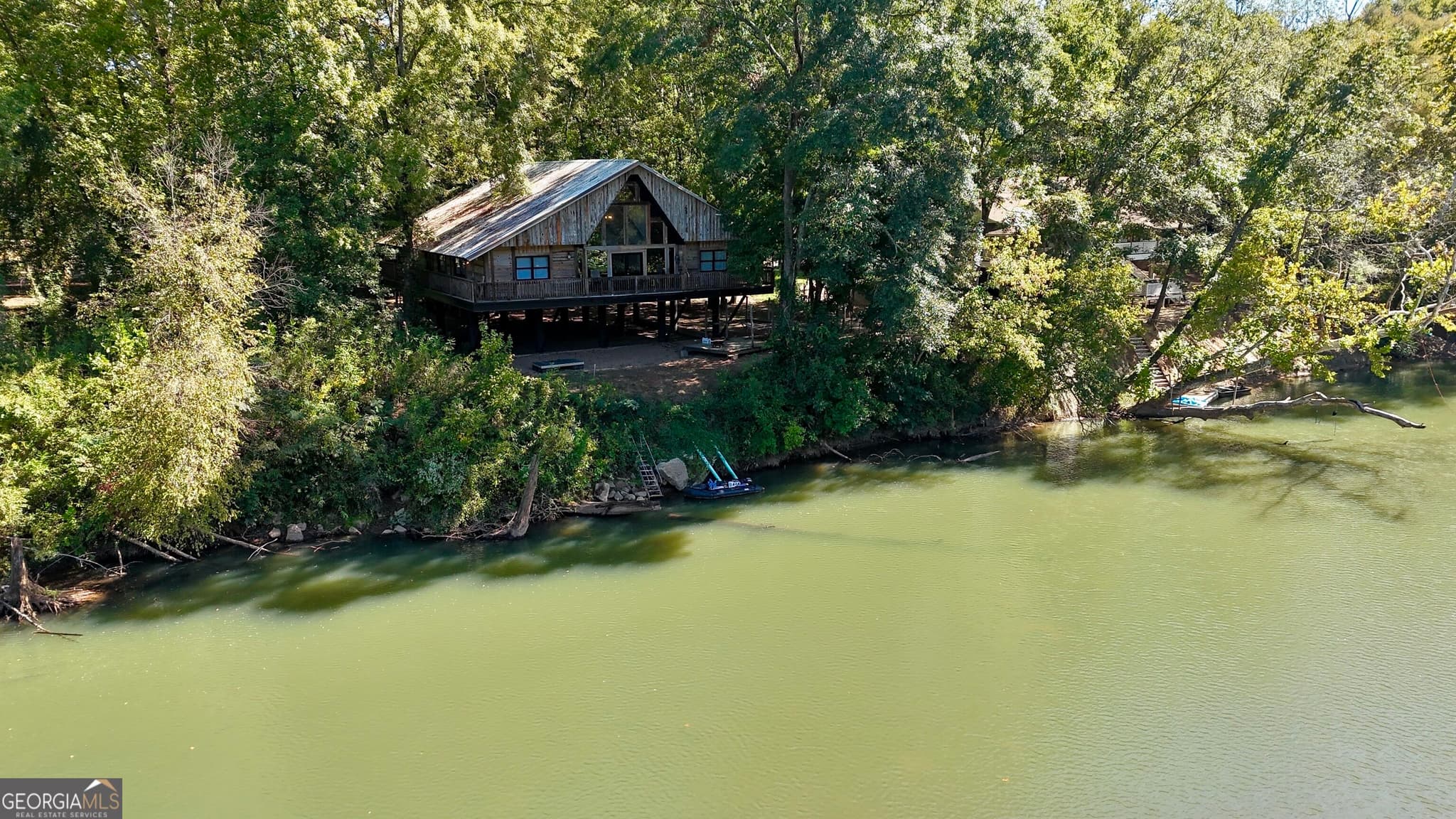 5 bedroom, 3 bathroom, 3,080 sq ft cabin,single family residence for sale at 621 Old River Road, Juliette, GA 31046 — photo 2