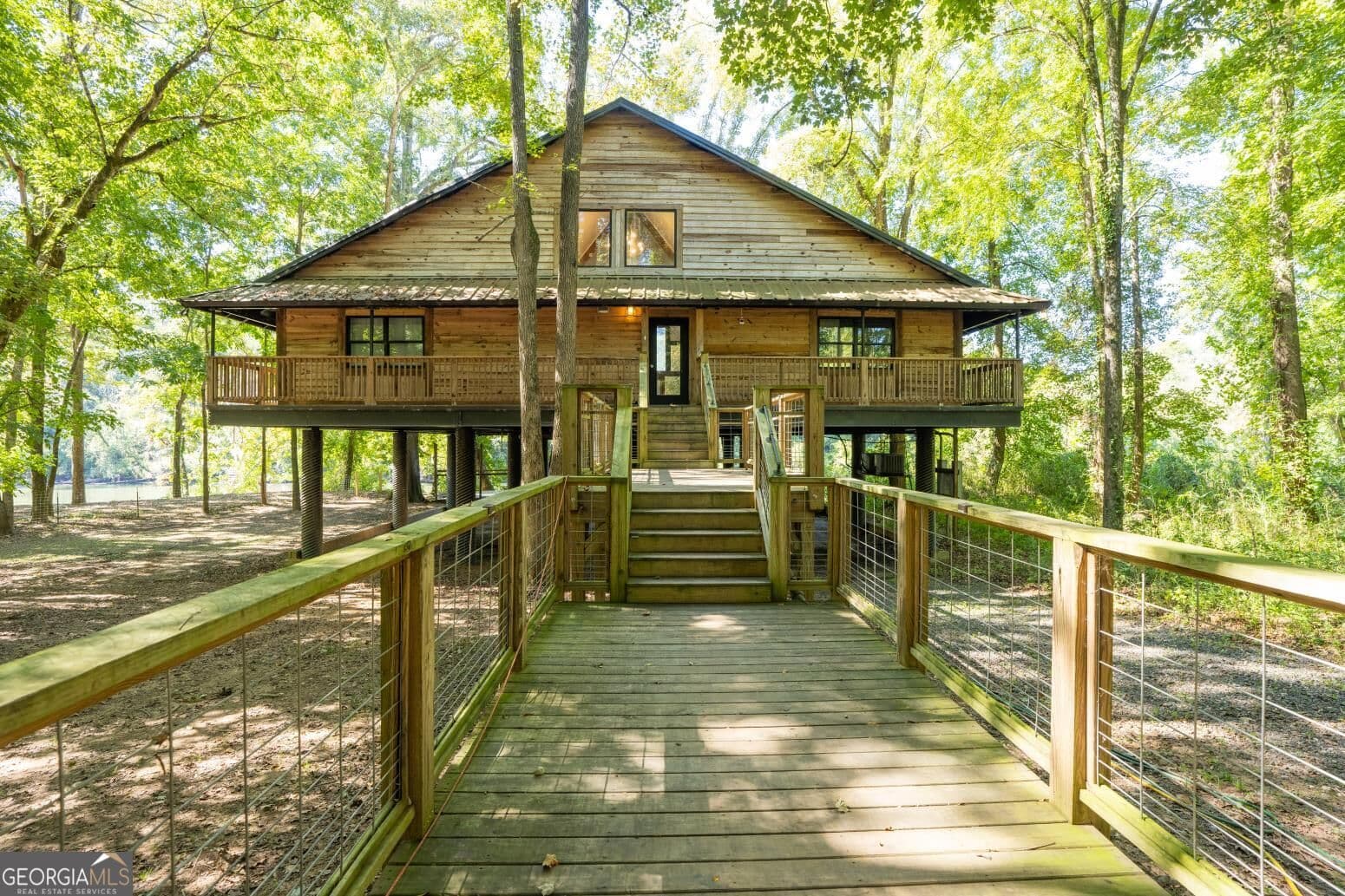 5 bedroom, 3 bathroom, 3,080 sq ft cabin,single family residence for sale at 621 Old River Road, Juliette, GA 31046