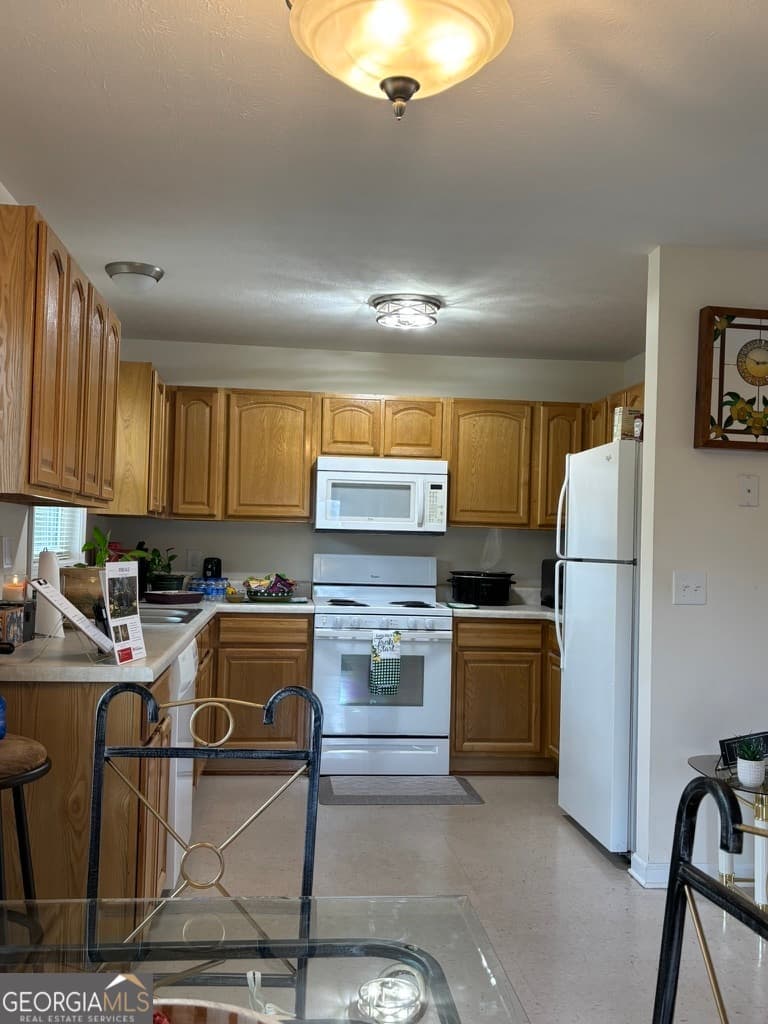 3 bedroom, 2 bathroom, 1,120 sq ft single family residence for sale at 405 Crawfordville Road, Union Point, GA 30669 — photo 6