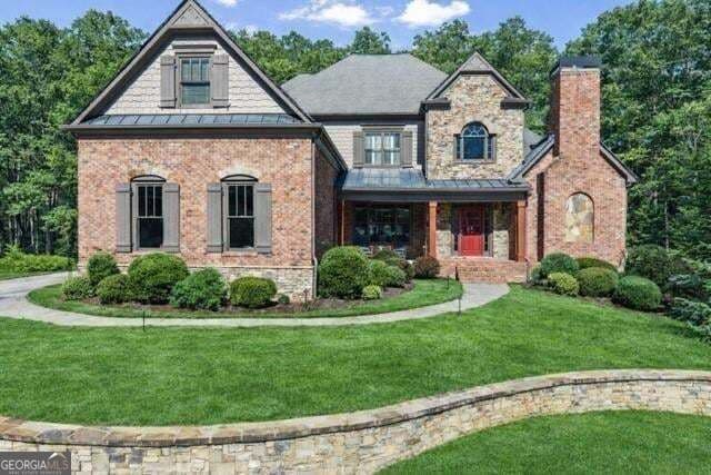 5 bedroom, 5 bathroom, 6,497 sq ft single family residence for sale at 1875 Southers Circle, Suwanee, GA 30024 — photo 1 of 82
