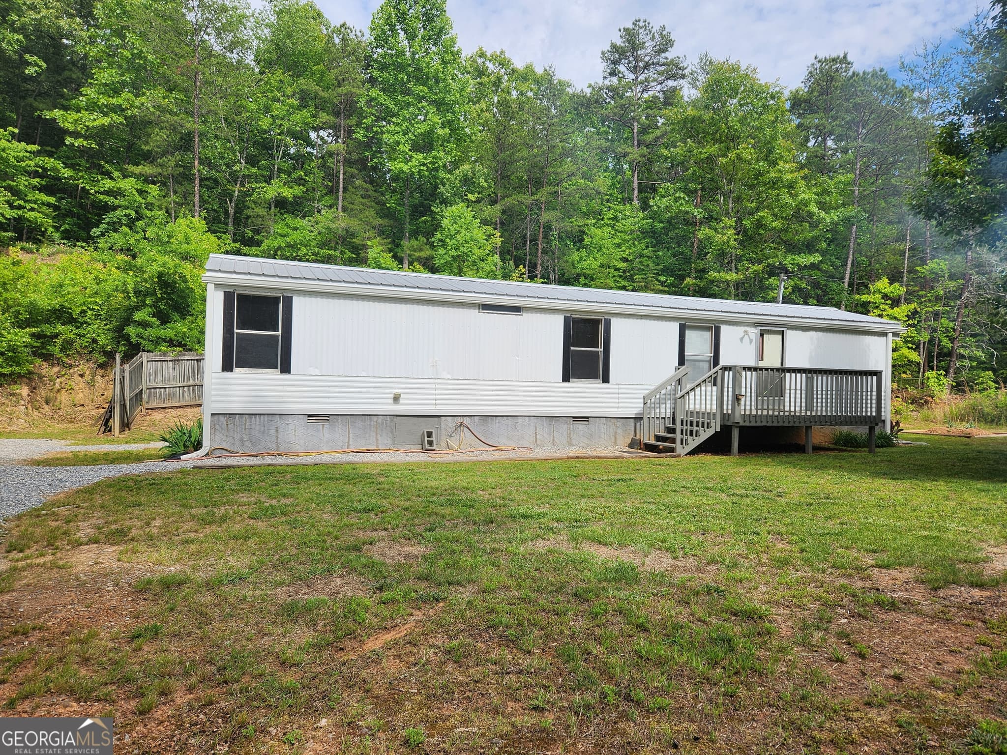 2 bedroom, 1 bathroom, 728 sq ft manufactured home,single family residence sold at 121 Rebecca Court, Dahlonega, GA 30533