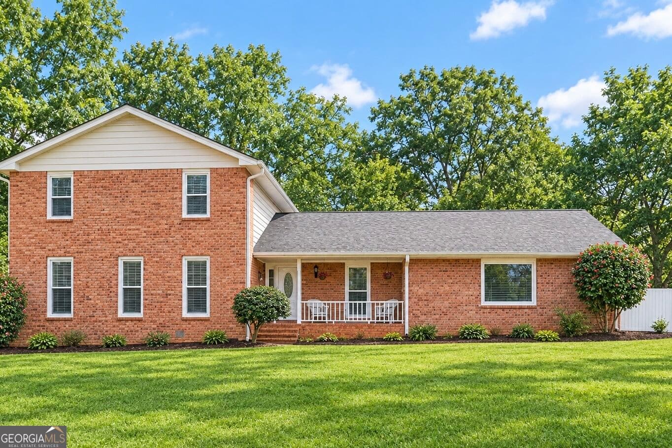 4 bedroom, 3 bathroom, 2,470 sq ft single family residence for sale at 2571 Highland Golf Course Drive, Conyers, GA 30013 — photo 1 of 34