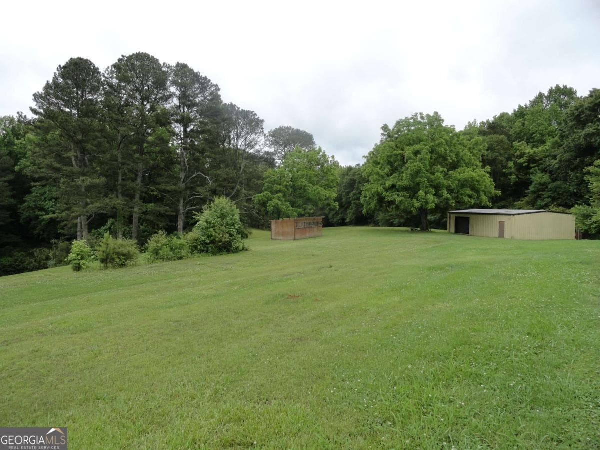 unimproved land for sale at 8664 Cumming Highway, Canton, GA 30115 — photo 3