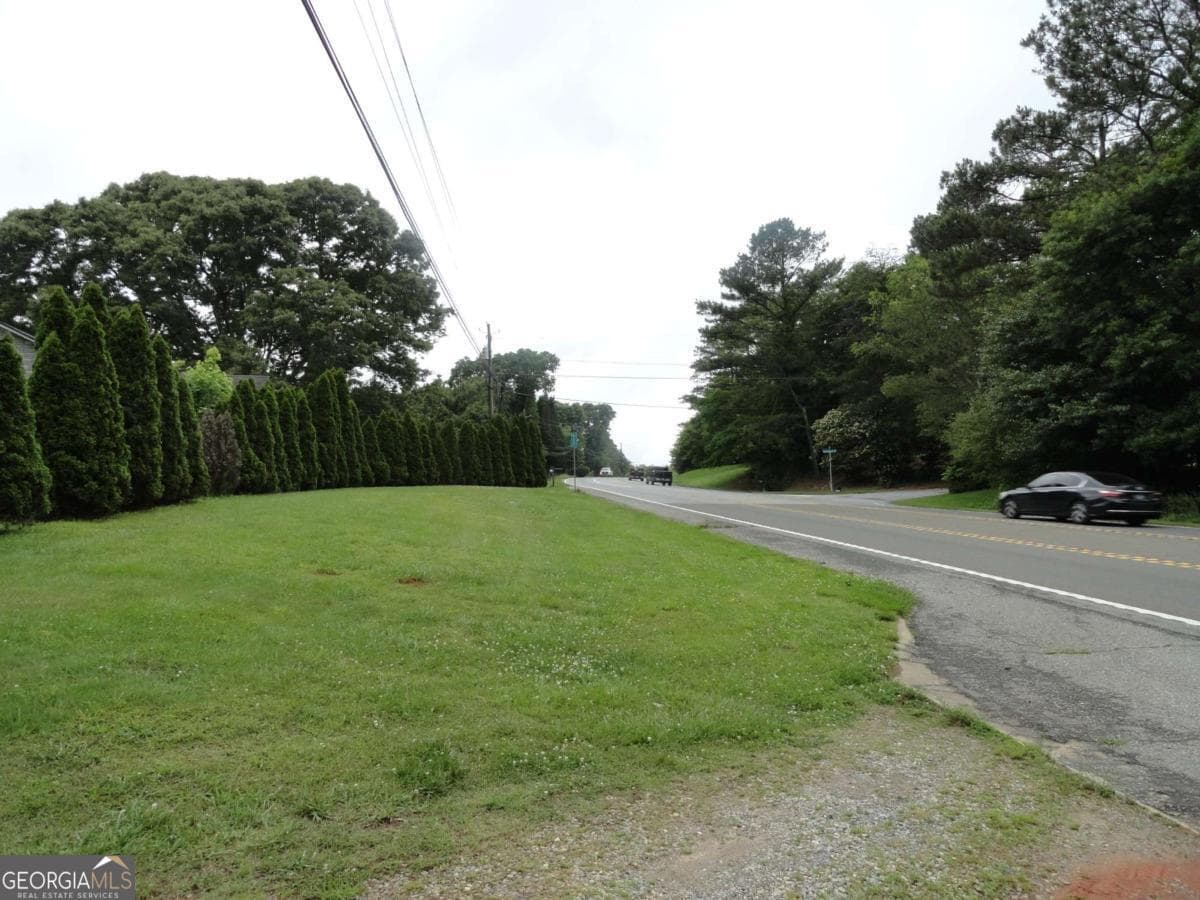 unimproved land for sale at 8664 Cumming Highway, Canton, GA 30115 — photo 1 of 17