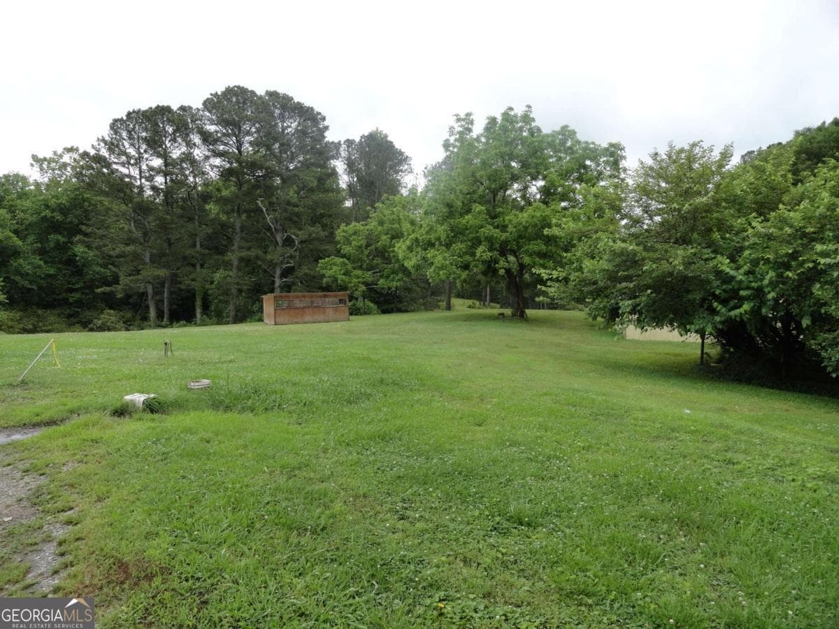 unimproved land for sale at 8664 Cumming Highway, Canton, GA 30115 — photo 5