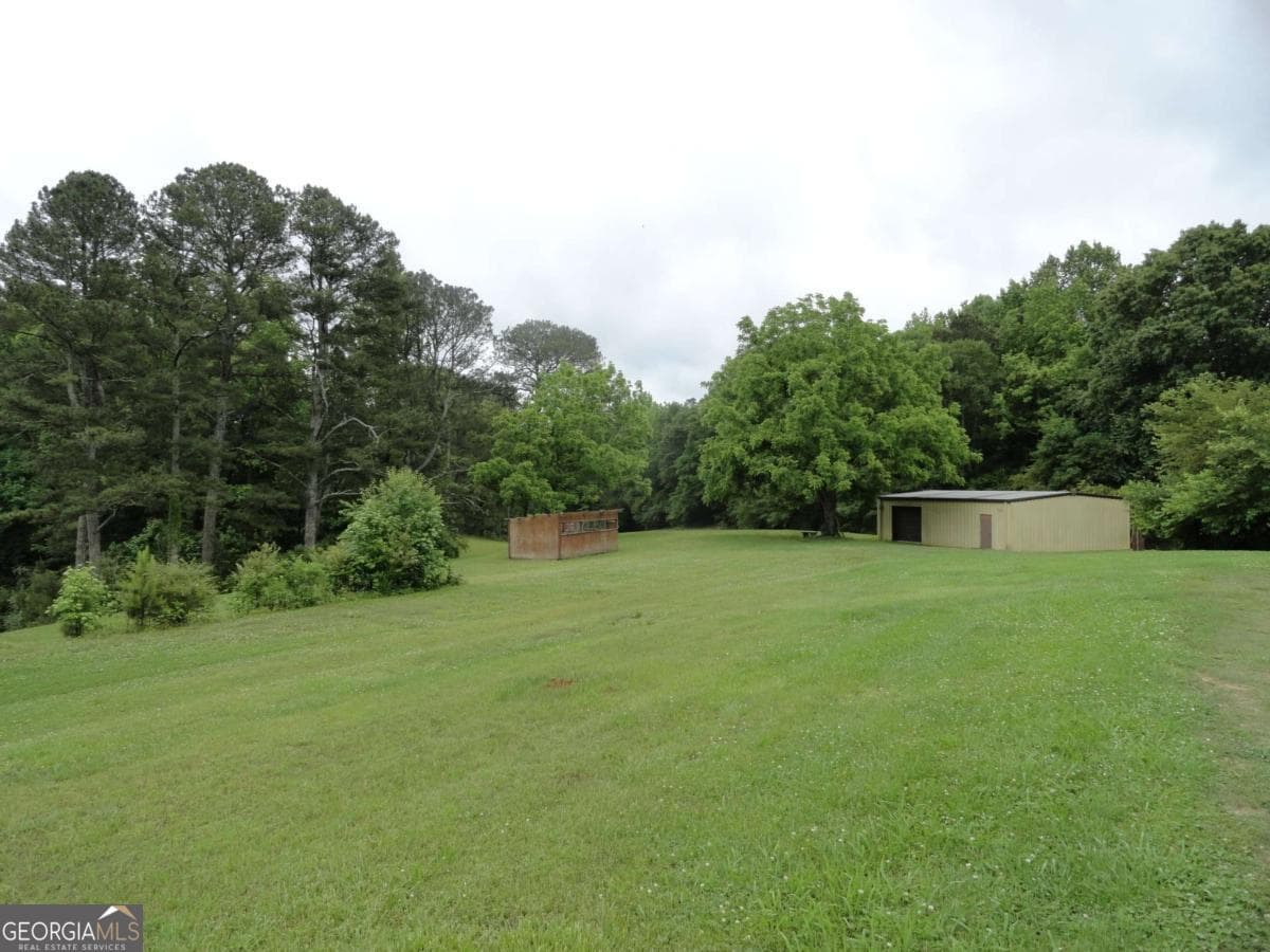 unimproved land for sale at 8664 Cumming Highway, Canton, GA 30115 — photo 4