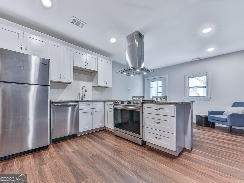 4 bedroom, 3.5 bathroom, 2,198 sq ft single family residence for sale at 925 Rice Street, Atlanta, GA 30318 — photo 8
