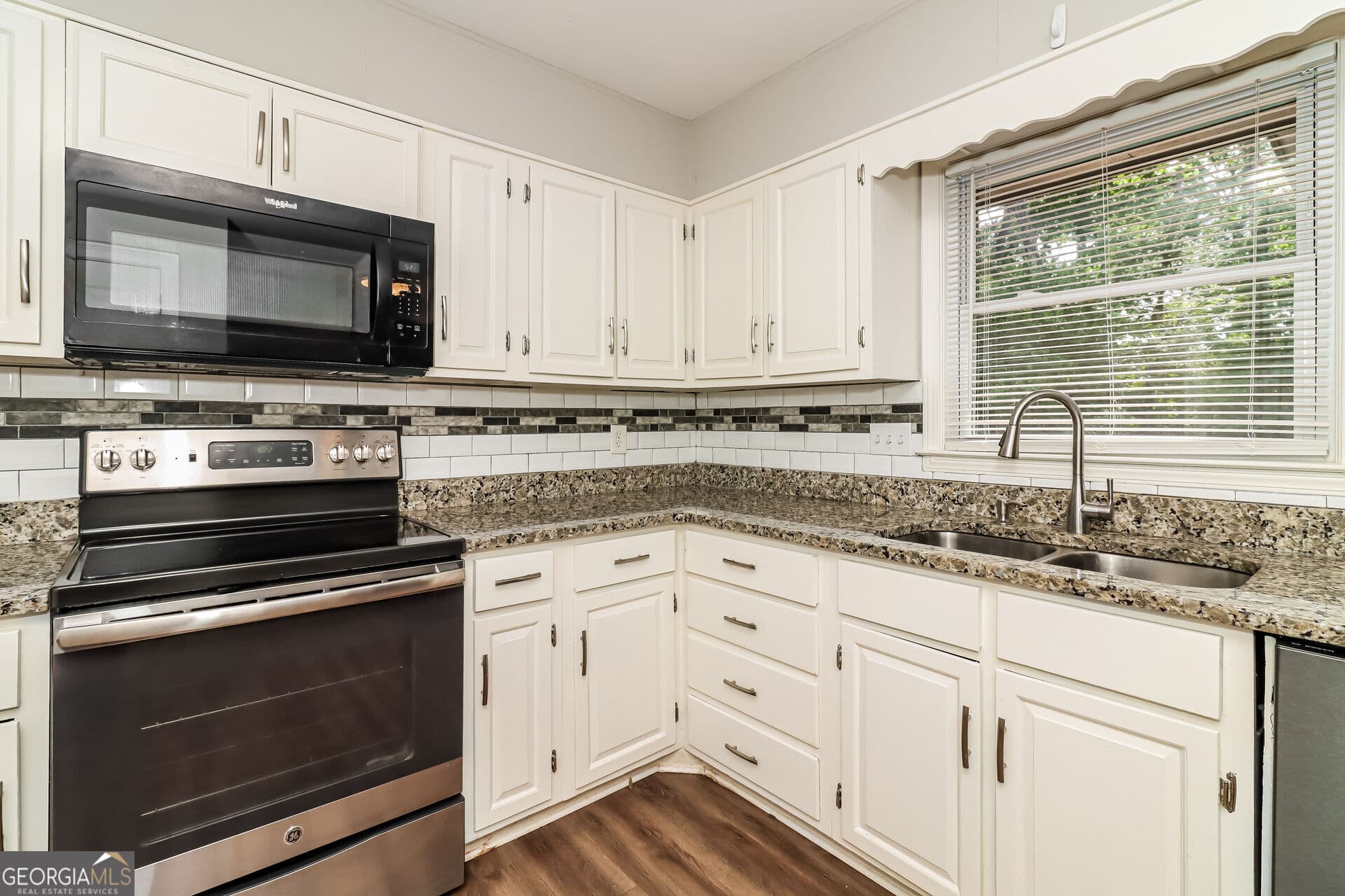 4 bedroom, 2 bathroom, 1,517 sq ft single family residence for sale at 3404 Sherrod Drive, Marietta, GA 30008 — photo 9