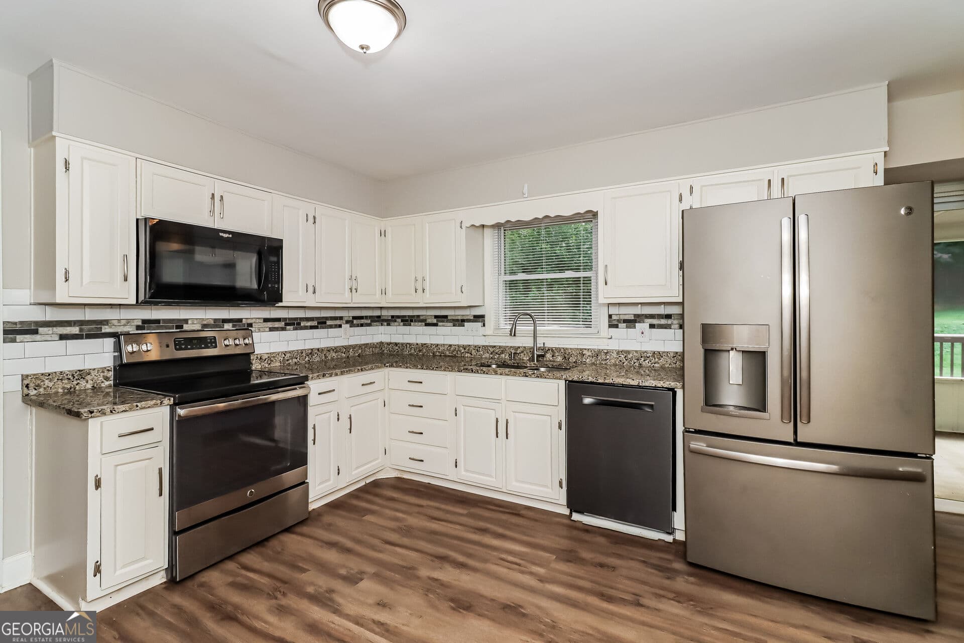 4 bedroom, 2 bathroom, 1,517 sq ft single family residence for sale at 3404 Sherrod Drive, Marietta, GA 30008 — photo 8