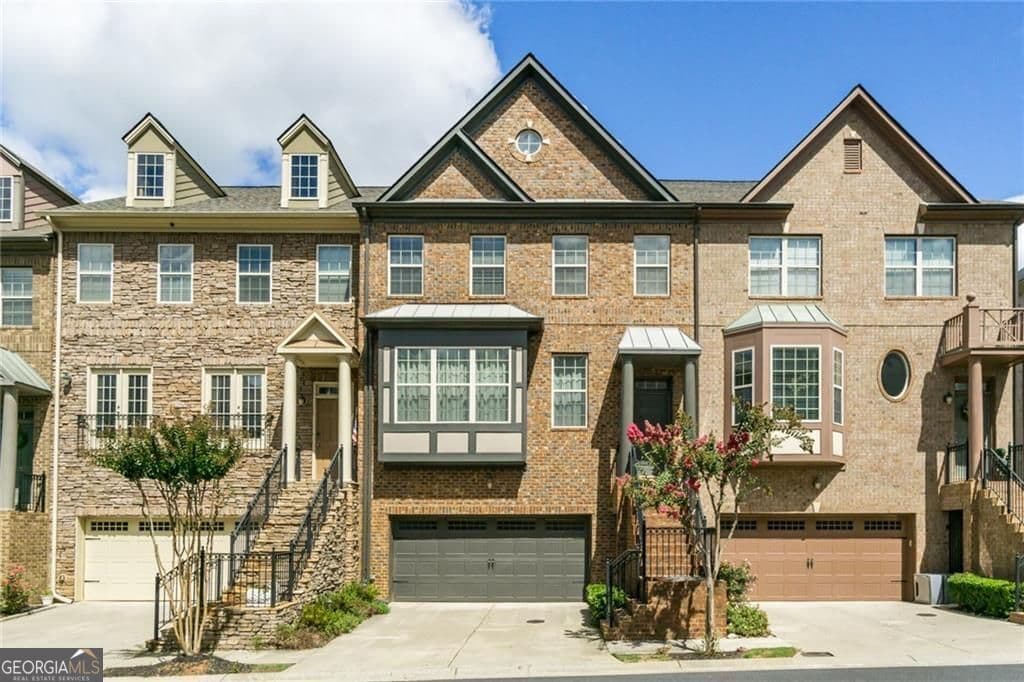 5 bedroom, 4.5 bathroom, 2,800 sq ft townhouse for rent at 9034 Woodland Trail, Alpharetta, GA 30009 for $4,500 a month — photo 1 of 1
