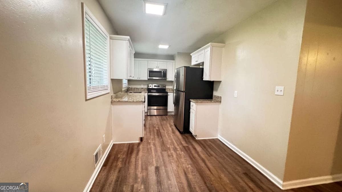 4 bedroom, 2 bathroom, 1,434 sq ft single family residence for sale at 4505 Wonder Valley Trail, Decatur, GA 30034 — photo 5