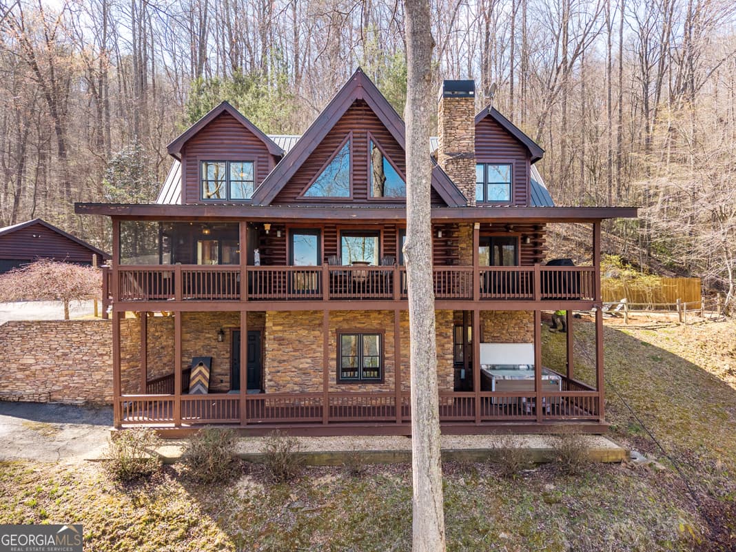 3 bedroom, 3.5 bathroom, 2,880 sq ft cabin,single family residence for sale at 91 Whispering Lake Way, Blue Ridge, GA 30513 — photo 2