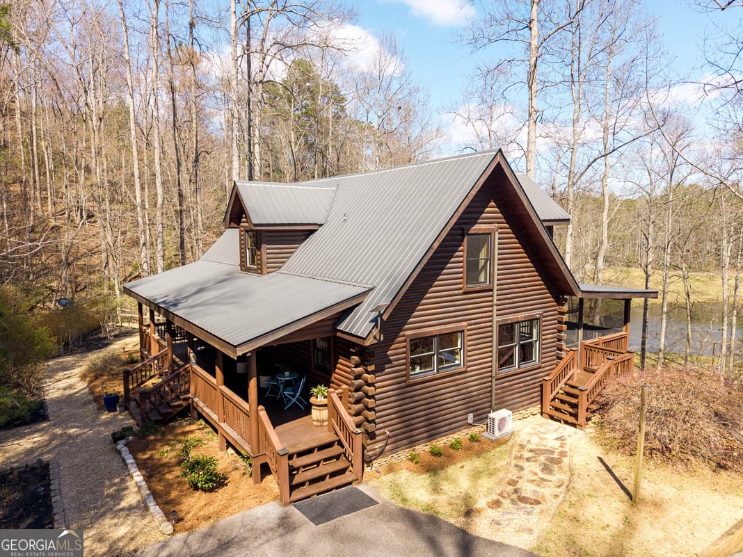 3 bedroom, 3.5 bathroom, 2,880 sq ft cabin,single family residence for sale at 91 Whispering Lake Way, Blue Ridge, GA 30513 — photo 3