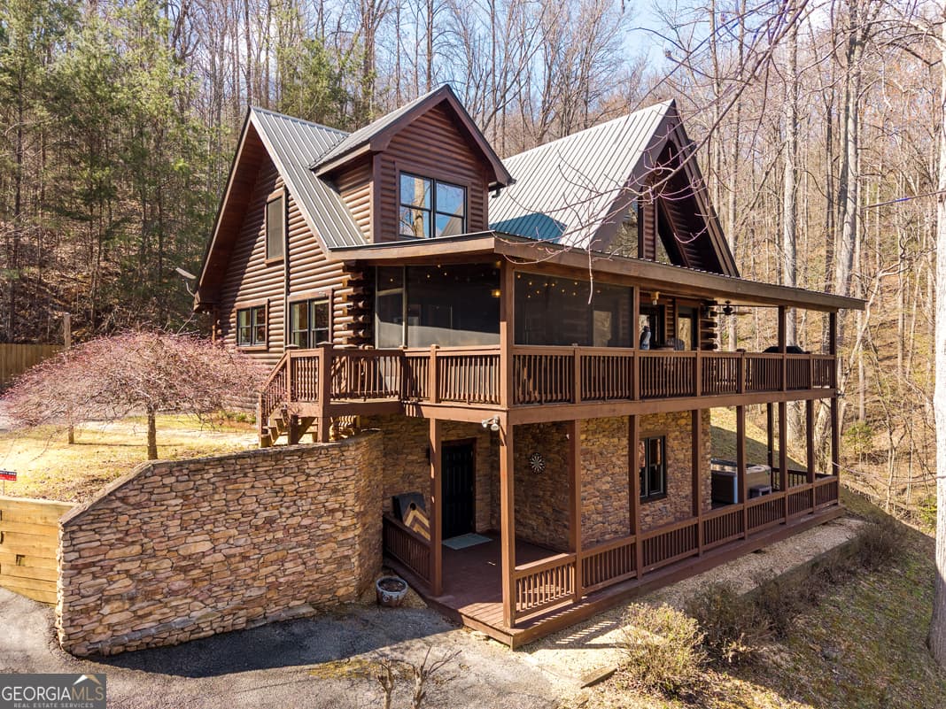 3 bedroom, 3.5 bathroom, 2,880 sq ft cabin,single family residence for sale at 91 Whispering Lake Way, Blue Ridge, GA 30513