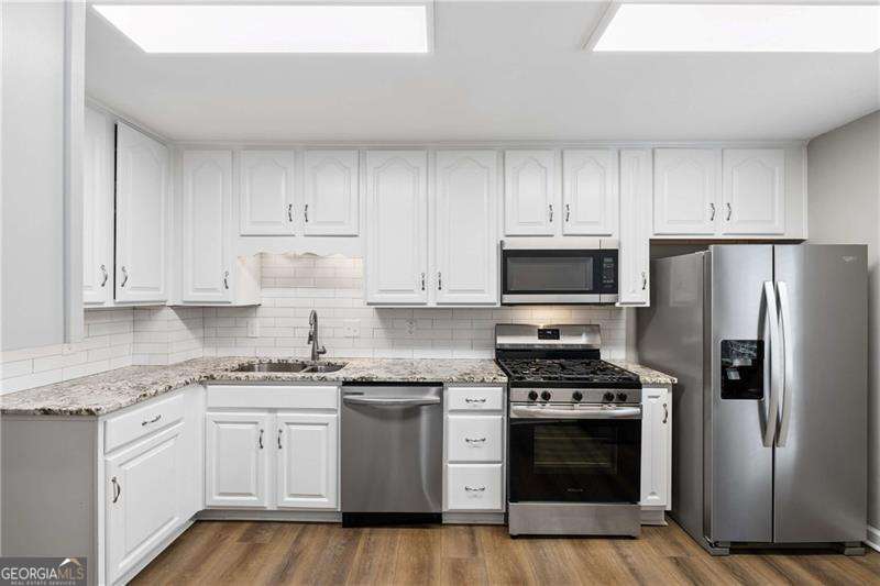 2 bedroom, 1.5 bathroom, 1,380 sq ft condominium for sale at 6500 Gaines Ferry Road G-1, Flowery Branch, GA 30542 — photo 5
