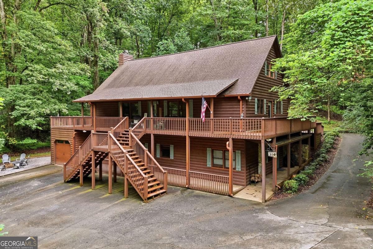 4 bedroom, 3.5 bathroom, 3,360 sq ft cabin,single family residence for sale at 314 Northcutt Road, Ellijay, GA 30540 — photo 1 of 70