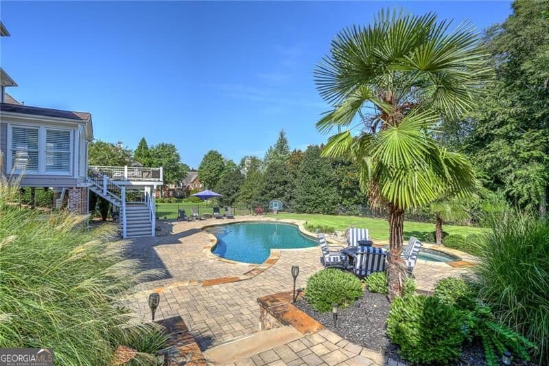 6 bedroom, 5.5 bathroom, 6,782 sq ft single family residence for sale at 1043 Meadow Club Court, Suwanee, GA 30024 — photo 7