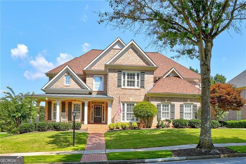 6 bedroom, 5.5 bathroom, 6,782 sq ft single family residence for sale at 1043 Meadow Club Court, Suwanee, GA 30024