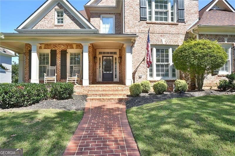 6 bedroom, 5.5 bathroom, 6,782 sq ft single family residence for sale at 1043 Meadow Club Court, Suwanee, GA 30024 — photo 10