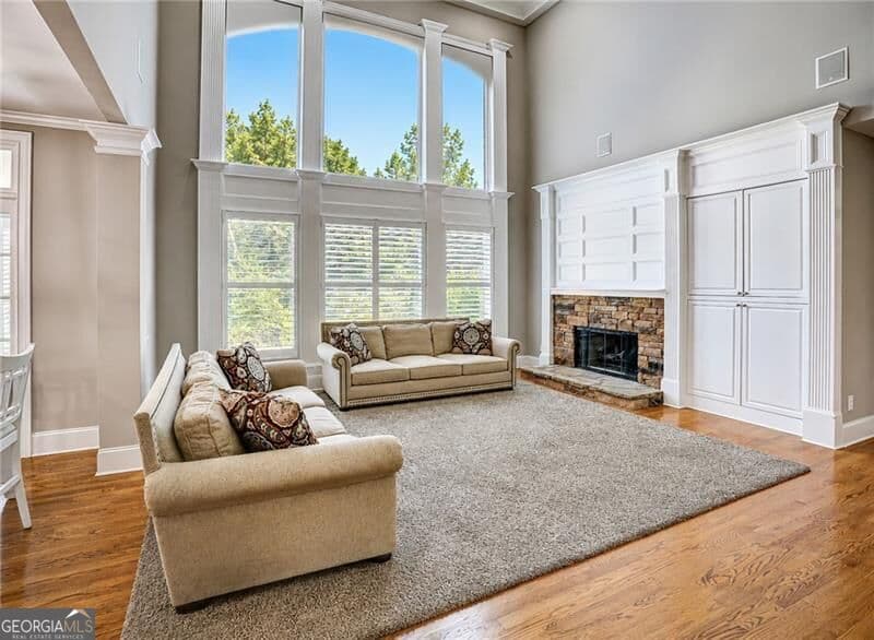 6 bedroom, 5.5 bathroom, 6,782 sq ft single family residence for sale at 1043 Meadow Club Court, Suwanee, GA 30024 — photo 4