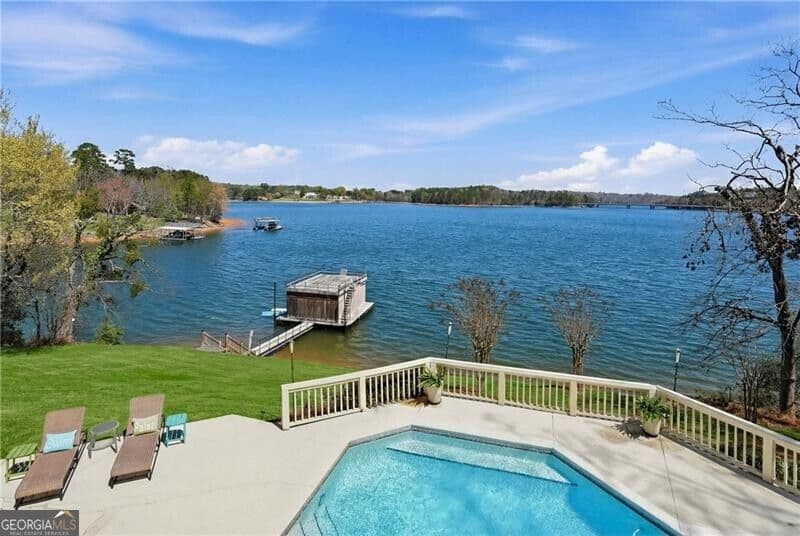 6 bedroom, 5.5 bathroom, 6,265 sq ft single family residence for sale at 2917 Pointe Drive, Gainesville, GA 30506 — photo 7