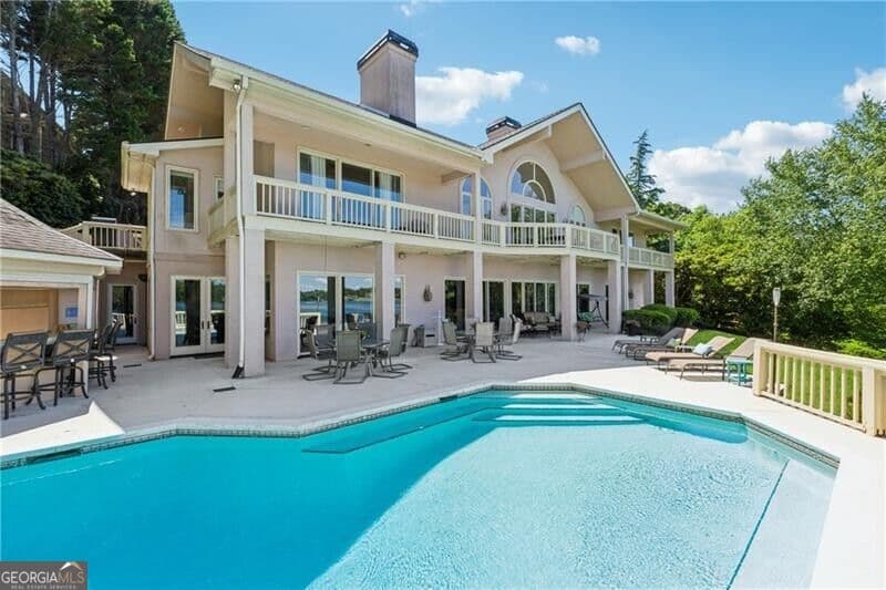 6 bedroom, 5.5 bathroom, 6,265 sq ft single family residence for sale at 2917 Pointe Drive, Gainesville, GA 30506 — photo 9