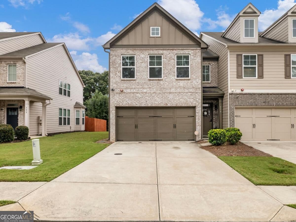 3 bedroom, 2.5 bathroom, 1,926 sq ft single family residence for sale at 779 Arbor Crowne Drive, Lawrenceville, GA 30045 — photo 1 of 48
