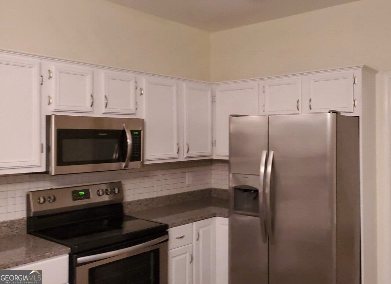 4 bedroom, 2.5 bathroom, 2,056 sq ft single family residence for sale at 720 Paris Drive, Lawrenceville, GA 30043 — photo 3