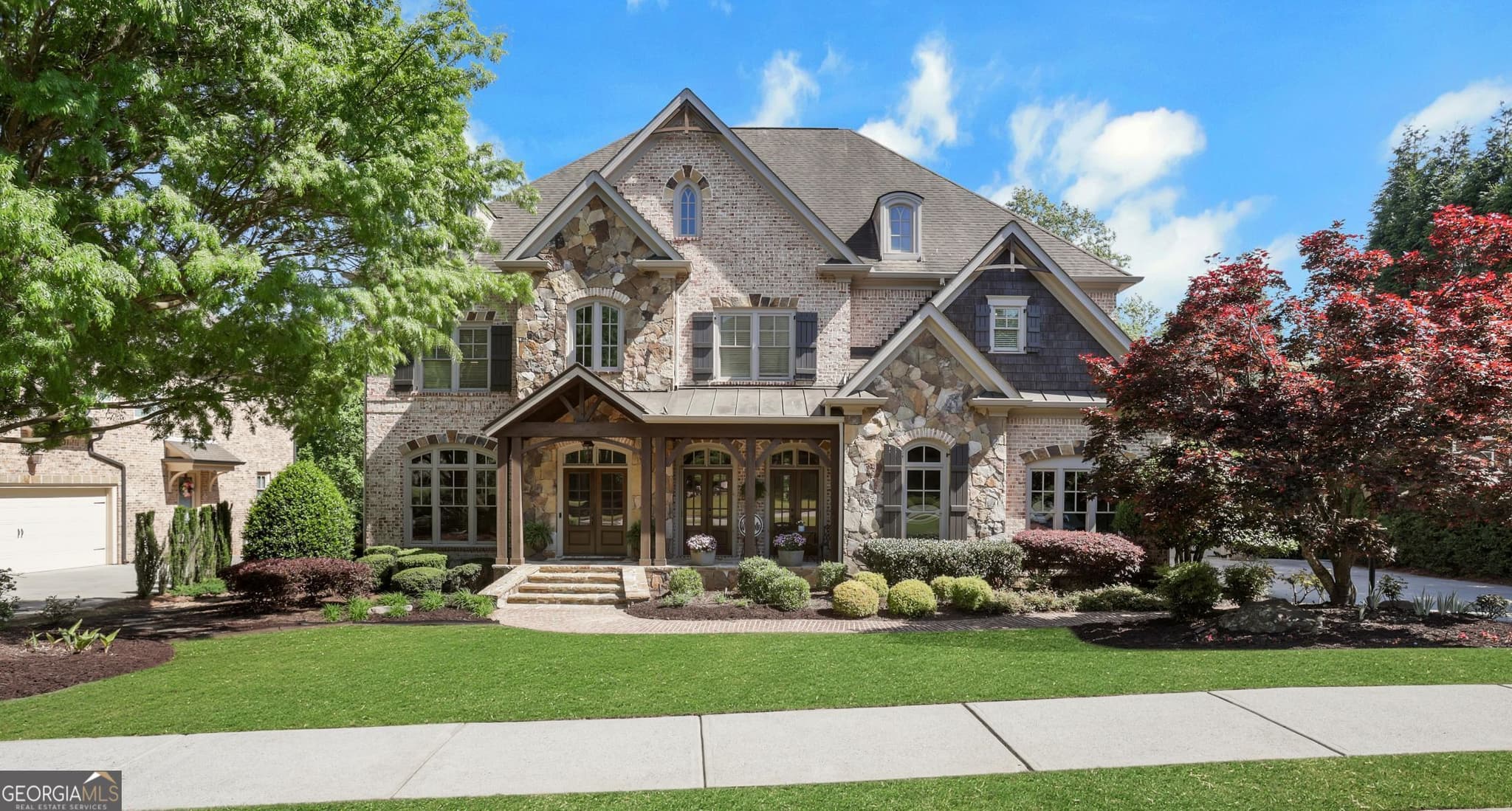 6 bedroom, 6.5 bathroom, 7,065 sq ft single family residence for sale at 1670 Cone Flower Way, Suwanee, GA 30024 — photo 3