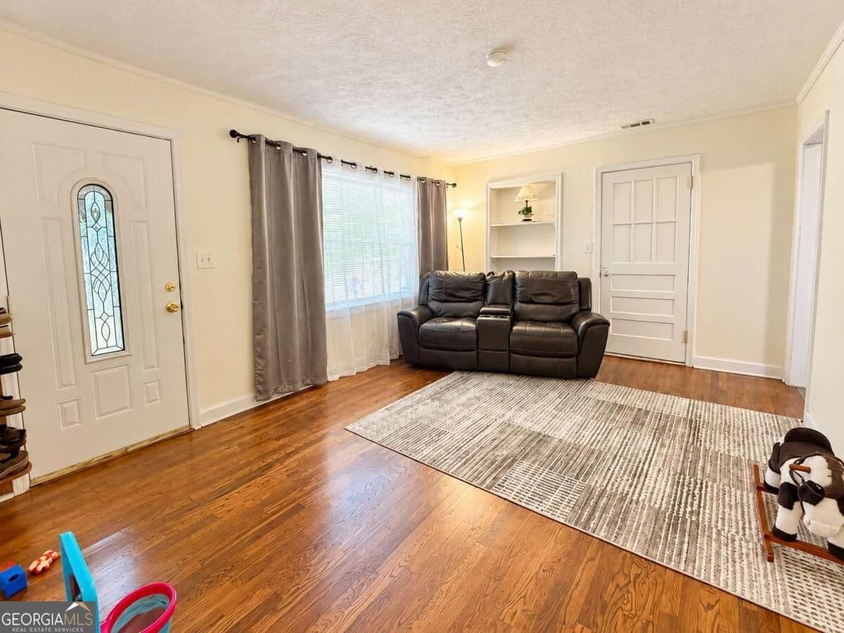 3 bedroom, 2 bathroom, 1,008 sq ft single family residence for sale at 4195 Hanes Drive, Decatur, GA 30035 — photo 3
