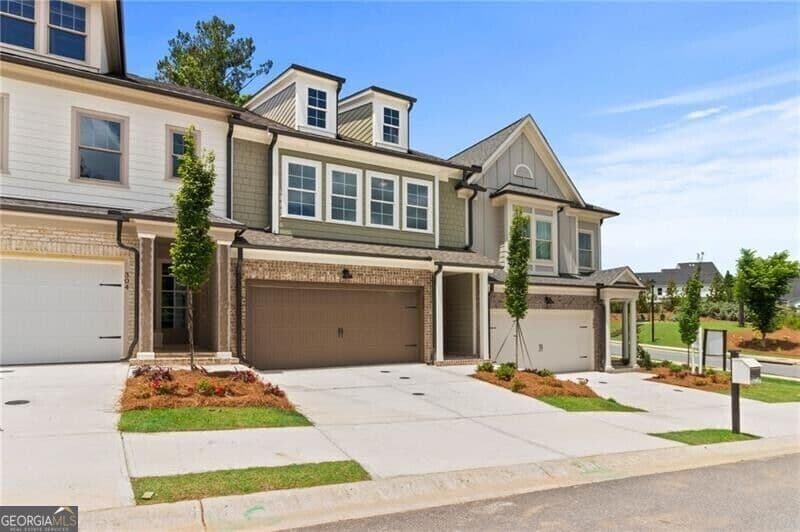 4 bedroom, 3.5 bathroom, 2,698 sq ft townhouse for sale at 302 North Rampart Street, Canton, GA 30114 — photo 1 of 23