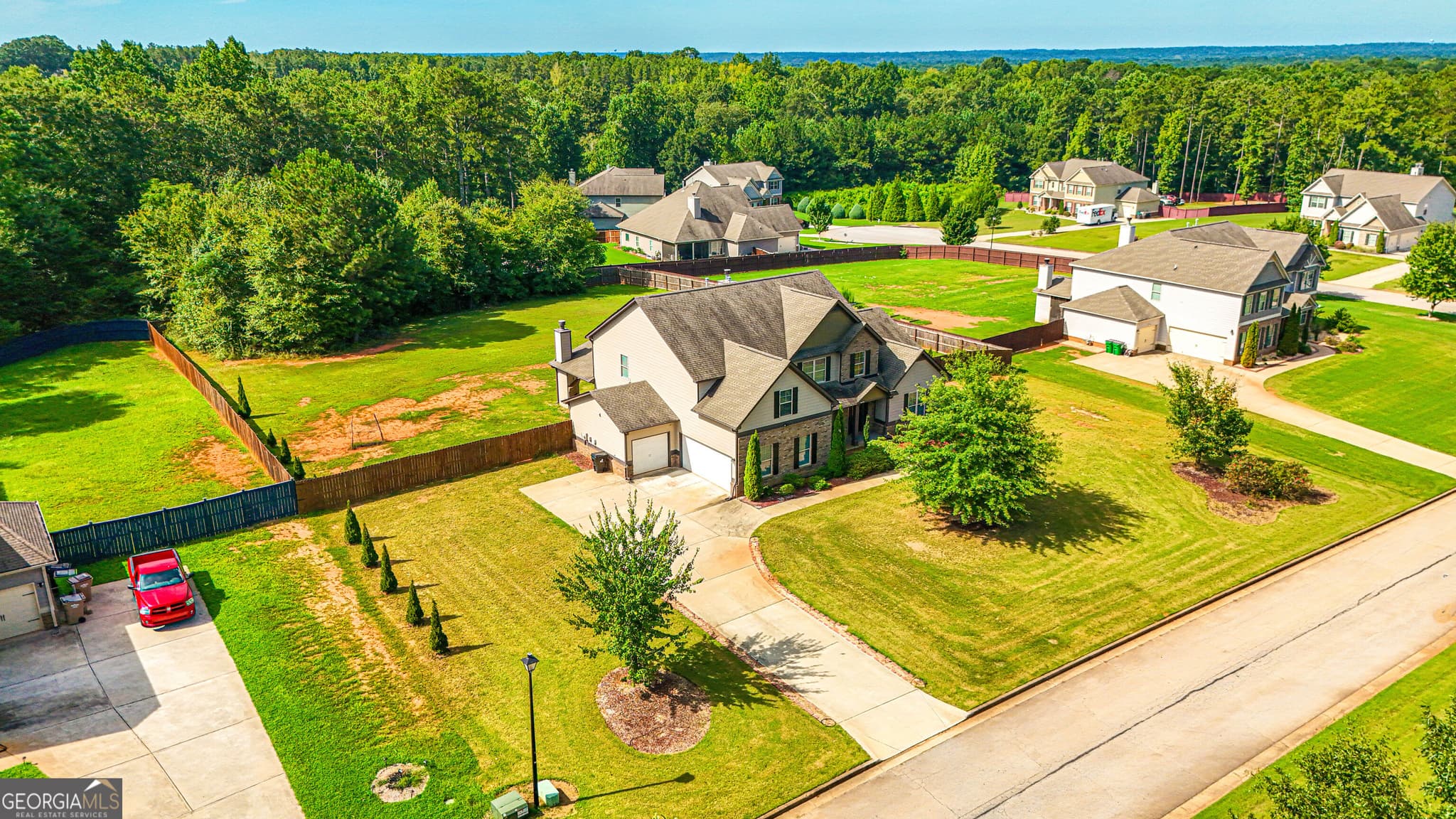 5 bedroom, 3.5 bathroom, 3,649 sq ft single family residence for sale at 205 Vandalay Way, Locust Grove, GA 30248 — photo 4