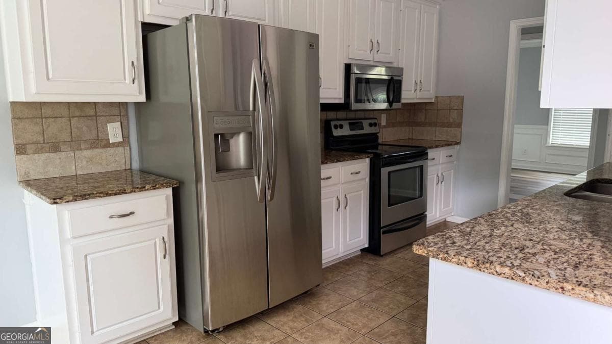 4 bedroom, 3 bathroom, 3,252 sq ft single family residence for sale at 1755 Katrina Jo Ann Circle, Dacula, GA 30019 — photo 7