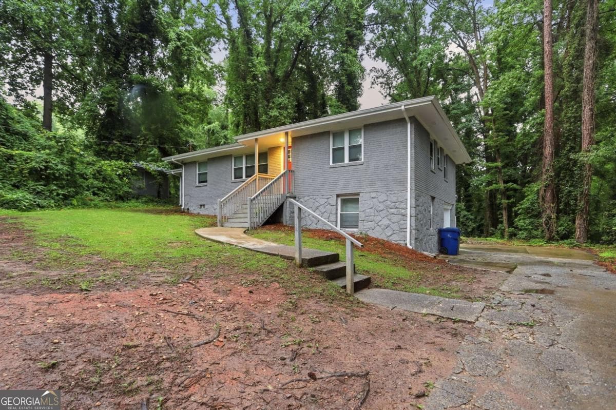 4 bedroom, 2.5 bathroom, 1,740 sq ft single family residence for sale at 3896 Rux Road, Atlanta, GA 30331 — photo 3