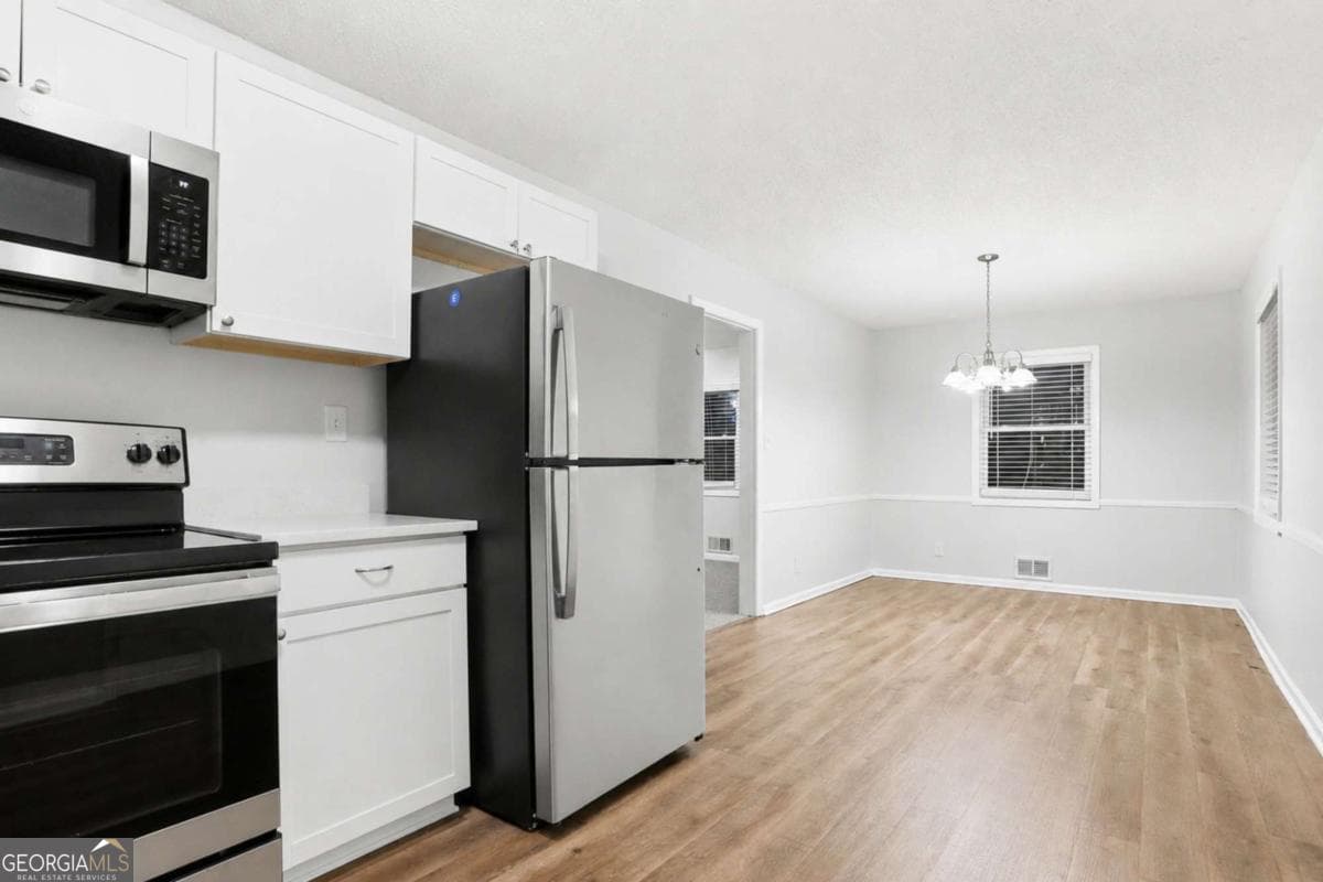 4 bedroom, 2.5 bathroom, 1,740 sq ft single family residence for sale at 3896 Rux Road, Atlanta, GA 30331 — photo 9