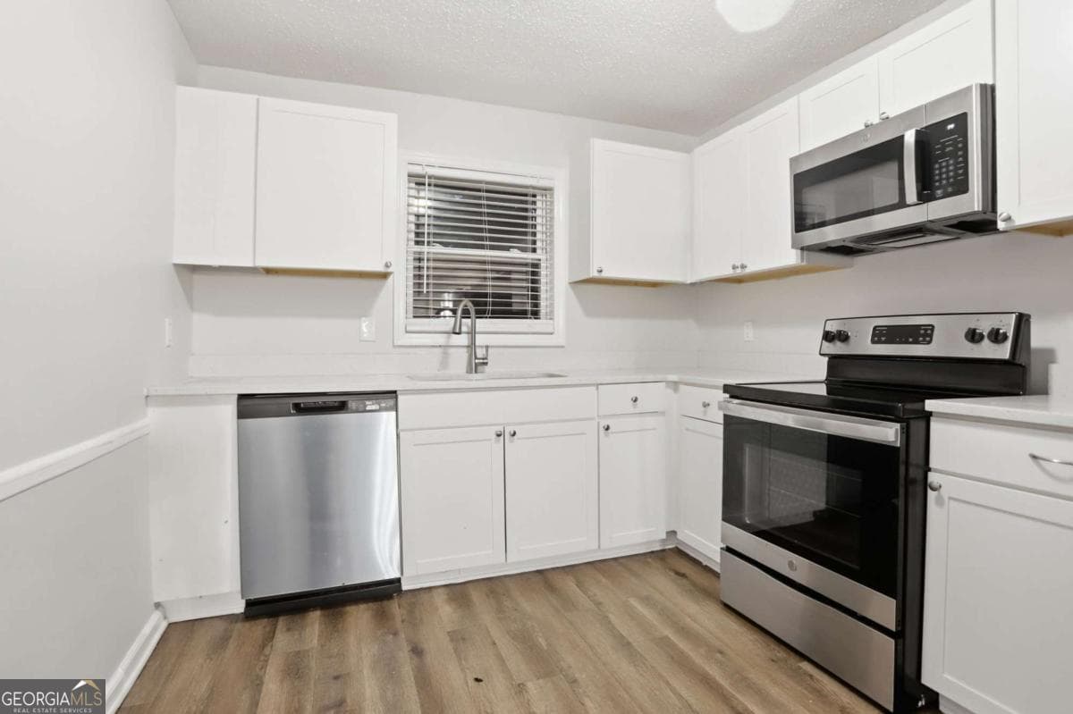 4 bedroom, 2.5 bathroom, 1,740 sq ft single family residence for sale at 3896 Rux Road, Atlanta, GA 30331 — photo 8