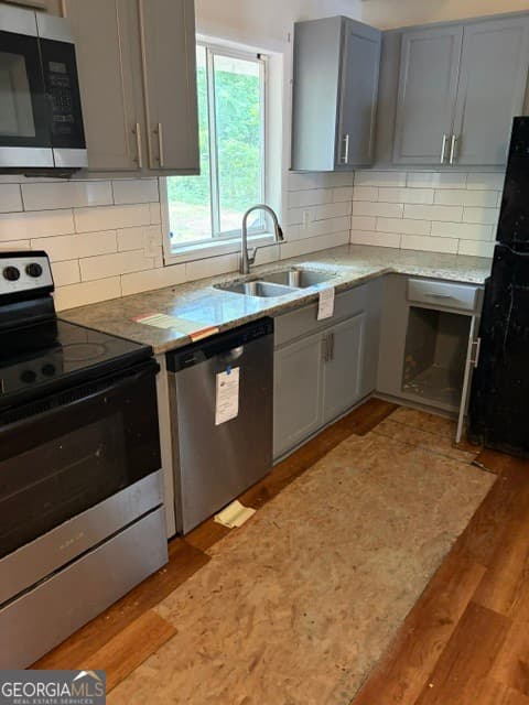4 bedroom, 2 bathroom, 1,625 sq ft single family residence for sale at 562 Roxbury Drive, Riverdale, GA 30274 — photo 6