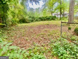 4 bedroom, 2 bathroom, 1,625 sq ft single family residence for sale at 562 Roxbury Drive, Riverdale, GA 30274 — photo 3